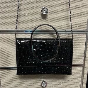 Black Clutch with Sleek Design and Wristlet